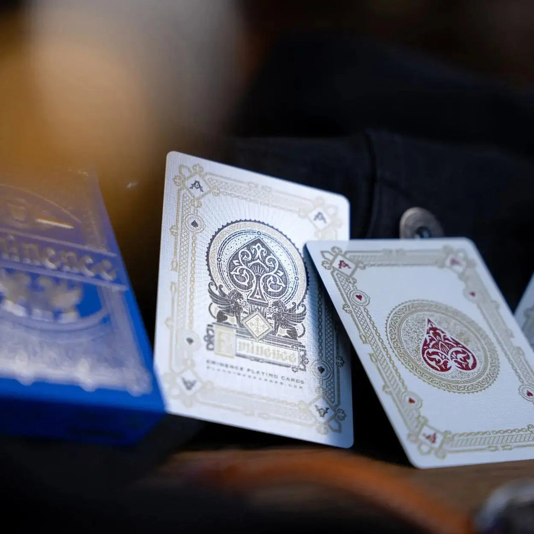 Eminence Blue Topaz playing cards featuring intricate designs and elegant details on the face cards