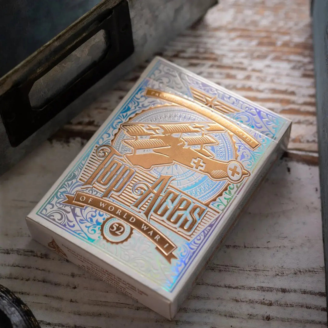 Top Aces WWI playing cards featuring an iridescent design and decorative artwork on the box