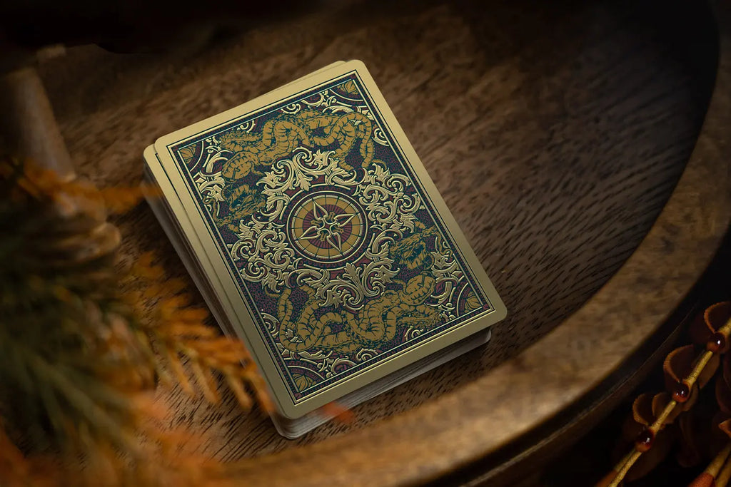 Blood and Brine ornate card back with compass and kraken artwork