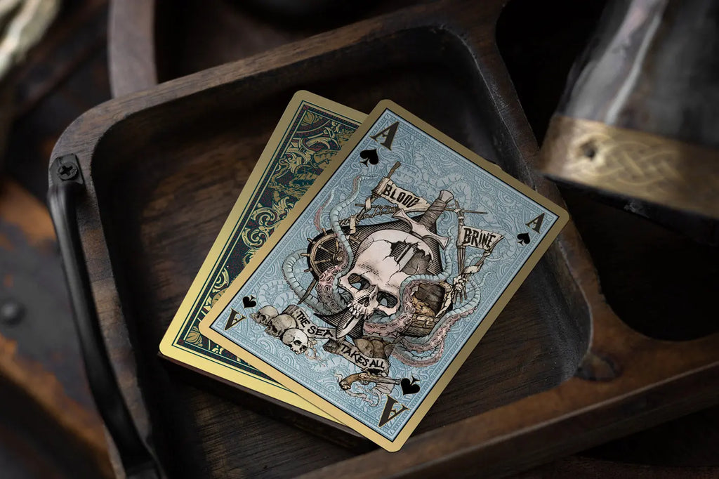 Blood and Brine Ace of Spades with skull, ship, and kraken artwork