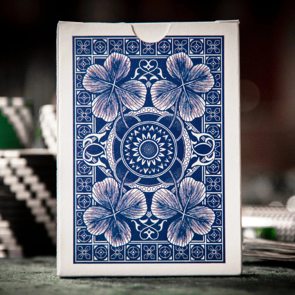 Apollo Blue playing cards featuring a floral design on the card box with intricate blue patterns