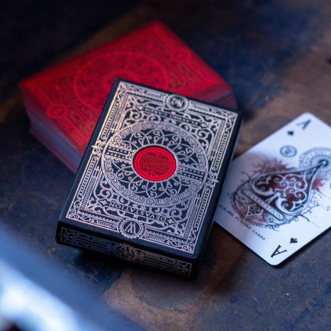 The Vault black deck of devastation silver edition playing cards with intricate design and Ace of Hearts