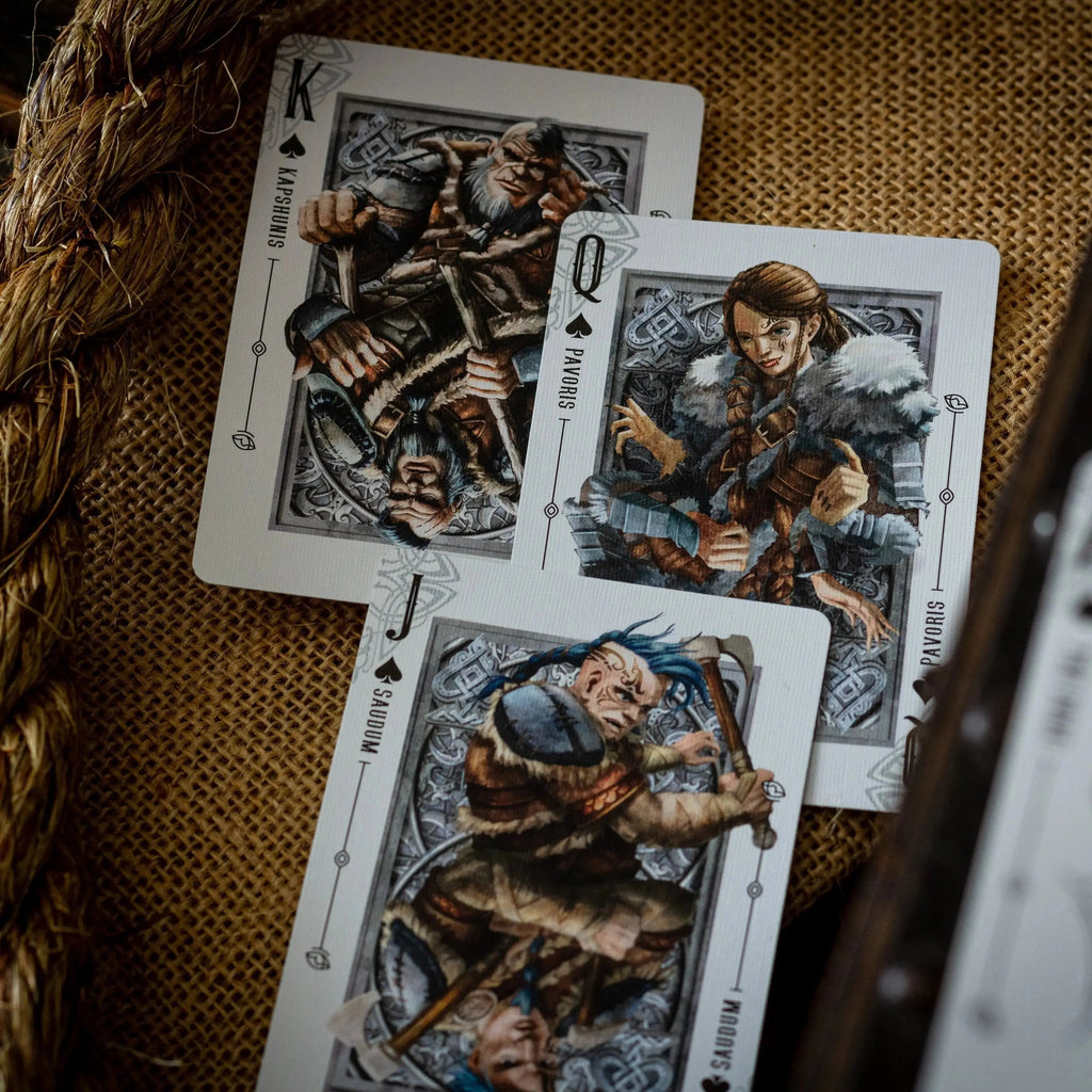 Luminosity LUX Gilded Edition deck featuring detailed King, Queen, and Joker playing cards