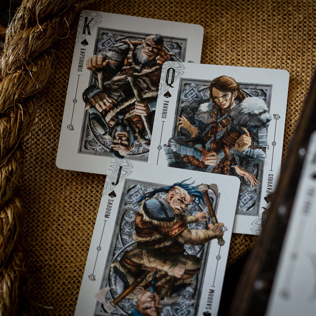 Luminosity LUX Gilded Edition deck featuring detailed King, Queen, and Joker playing cards