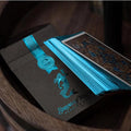 Sirens Nymphs playing cards in a decorative box with vibrant blue edges and a mermaid design