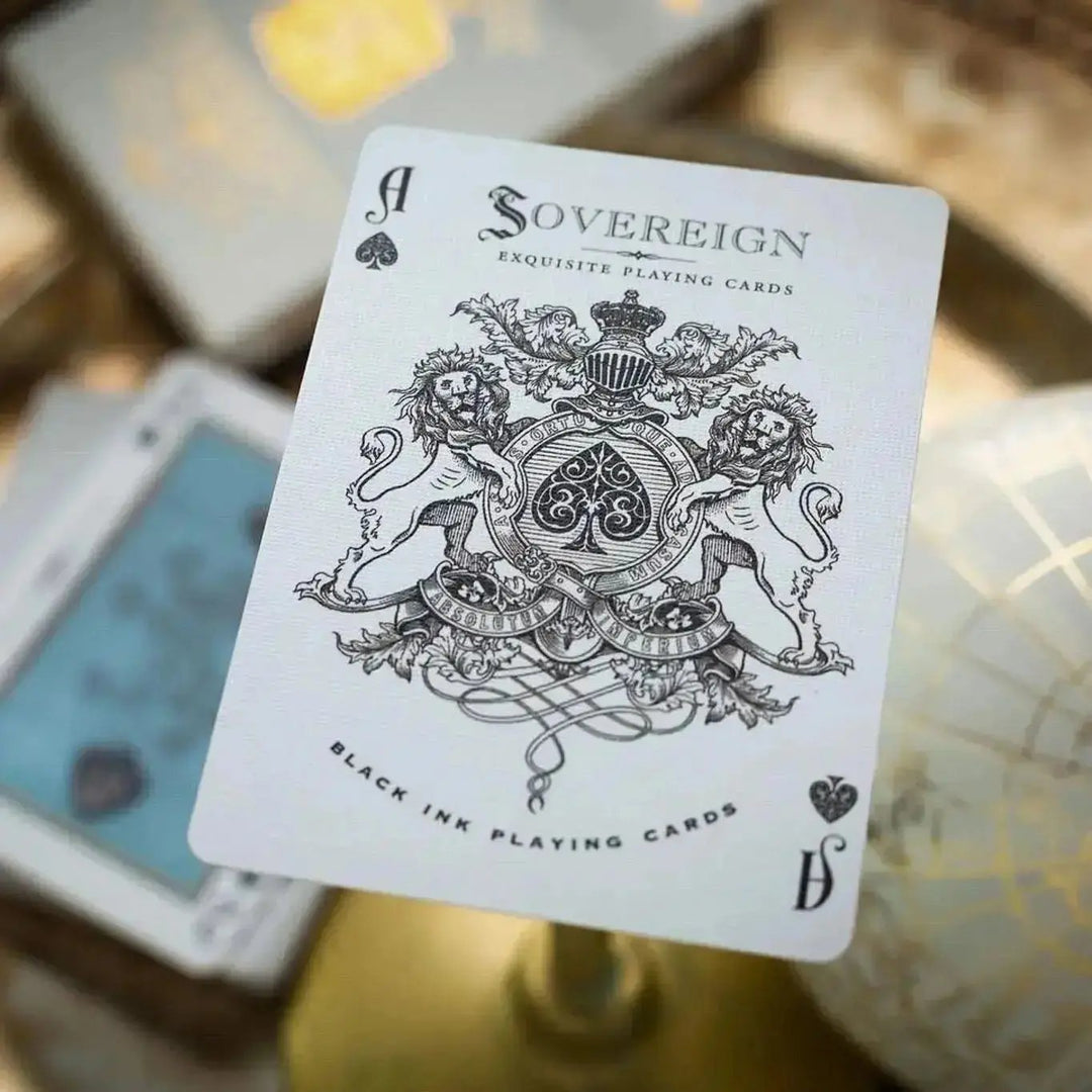 Sovereign luxury playing cards by Black Ink Branded with intricate designs and a royal emblem
