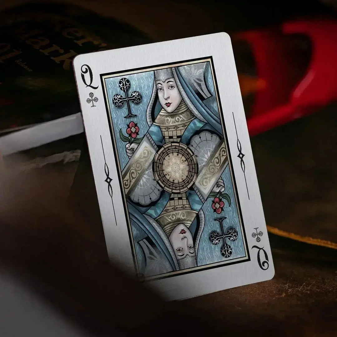 Sovereign luxury playing cards featuring an intricately designed queen card with elegant artwork