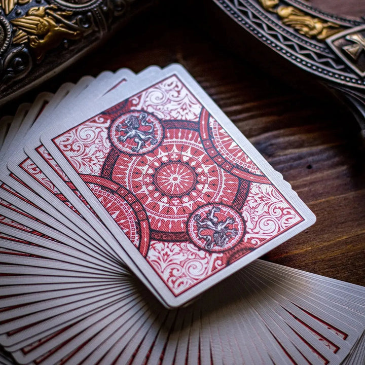 Sovereign luxury playing cards featuring intricate red and gold designs for premium game nights