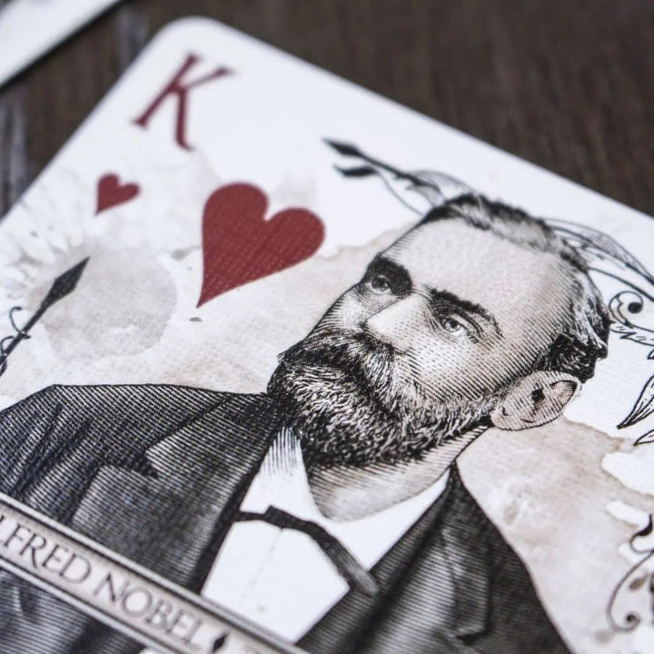 Close-up of devastation silver edition playing cards featuring a King design with a historical portrait