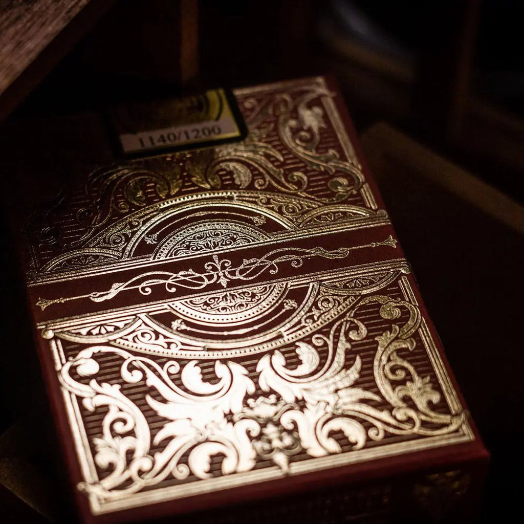 Golden Spike 150th Anniversary playing cards in an intricately designed red box with gold accents