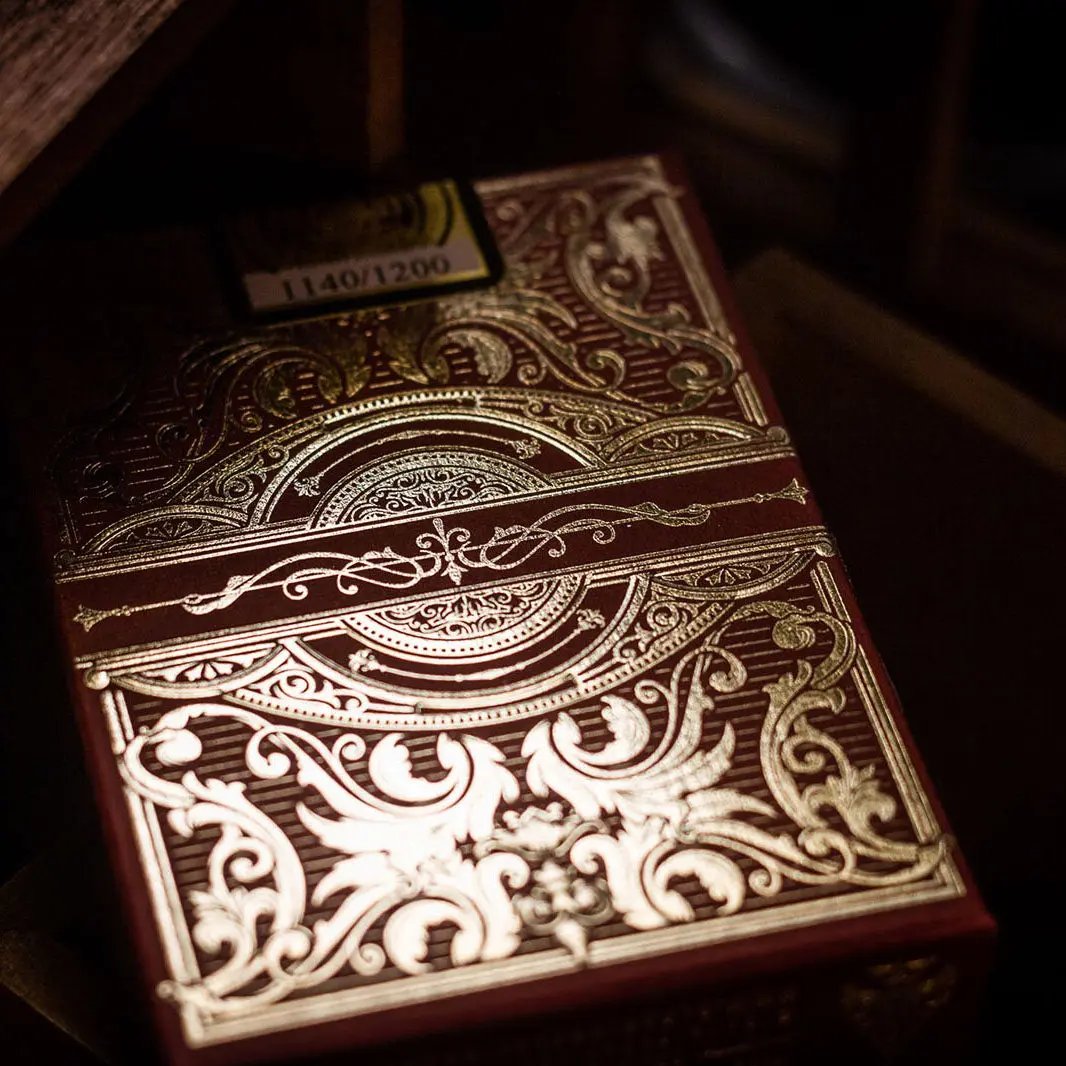 Golden Spike 150th Anniversary playing cards in an intricately designed red box with gold accents