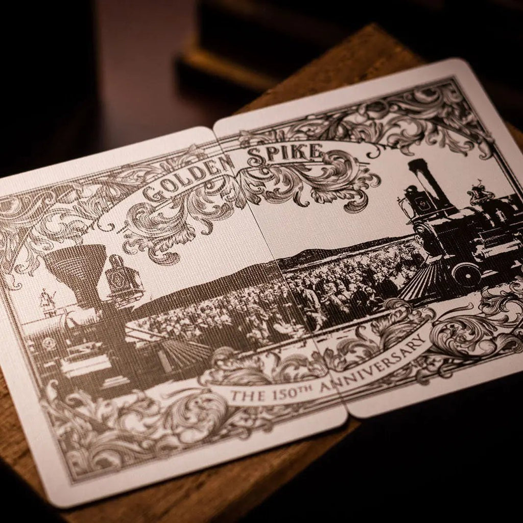 Golden Spike 150th Anniversary playing cards featuring detailed historical artwork and vintage design.