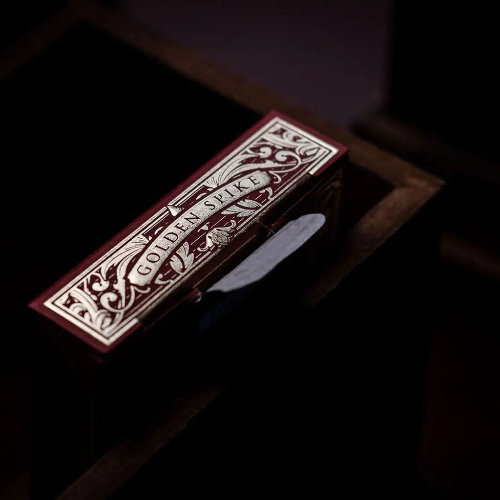 Golden Spike 150th Anniversary playing cards in an ornate box with detailed design