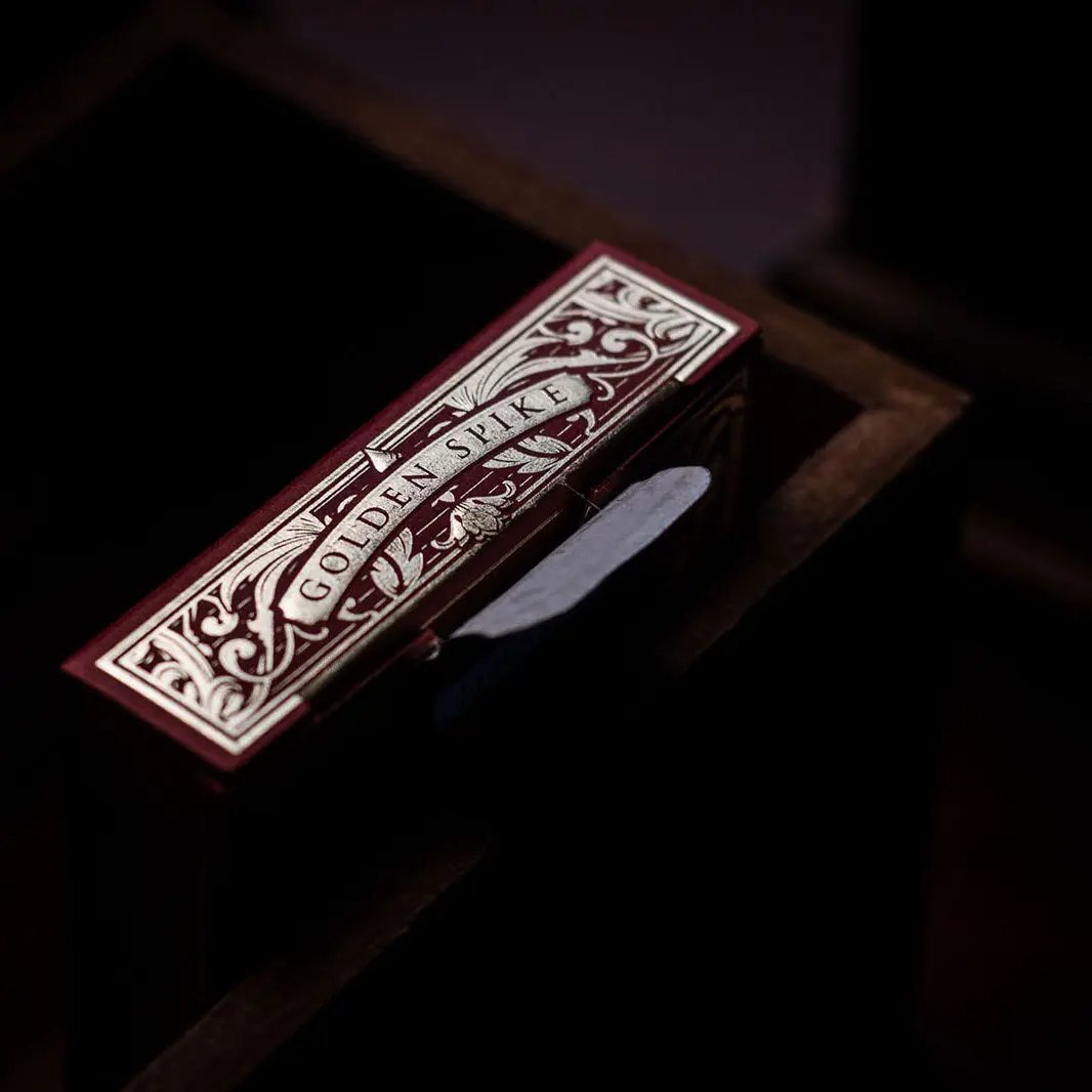 Golden Spike 150th Anniversary playing cards in an ornate box with detailed design
