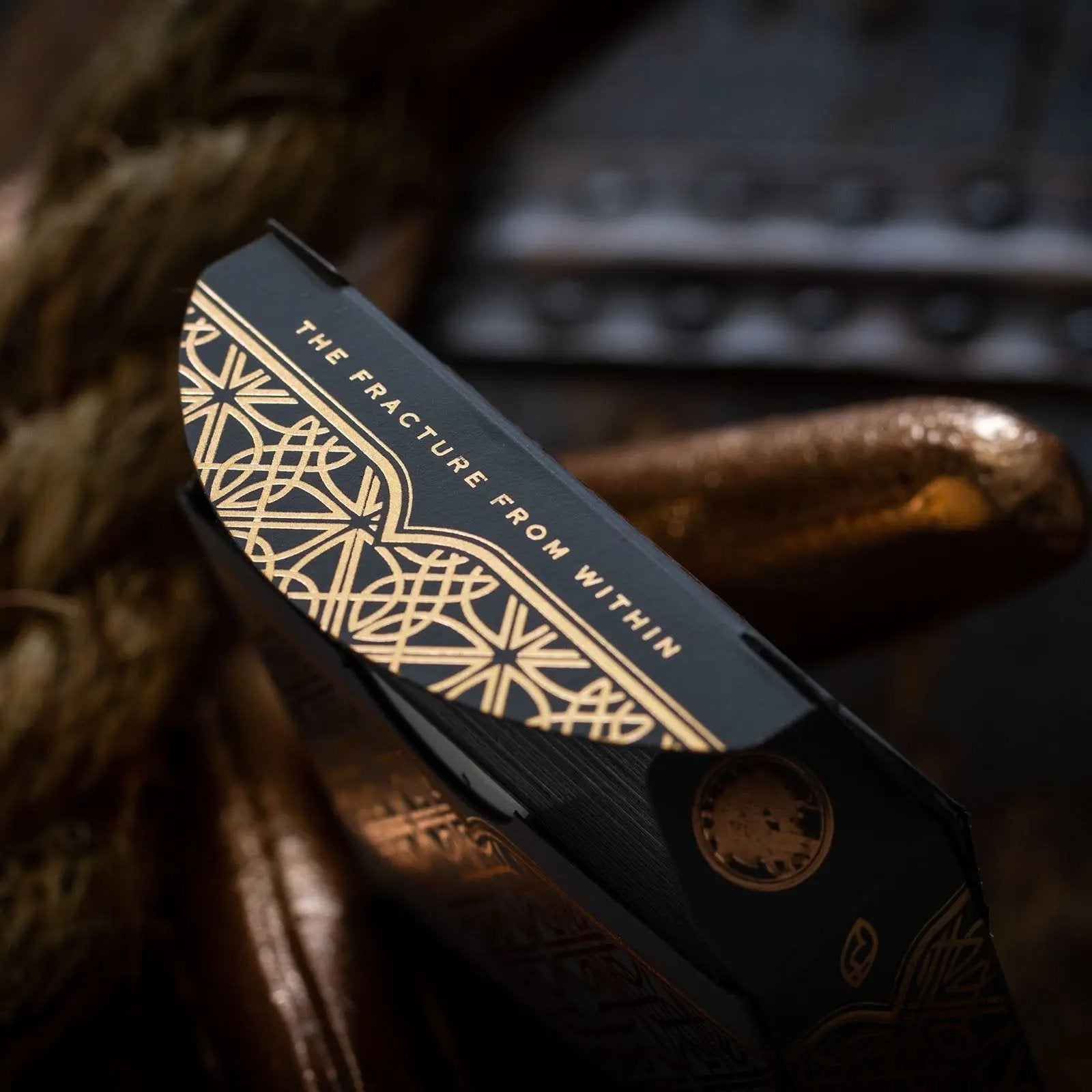 Close-up of Luminosity playing cards box featuring intricate design and detailed patterns