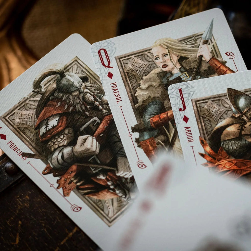 Luminosity playing cards featuring intricate illustrations of characters and unique designs