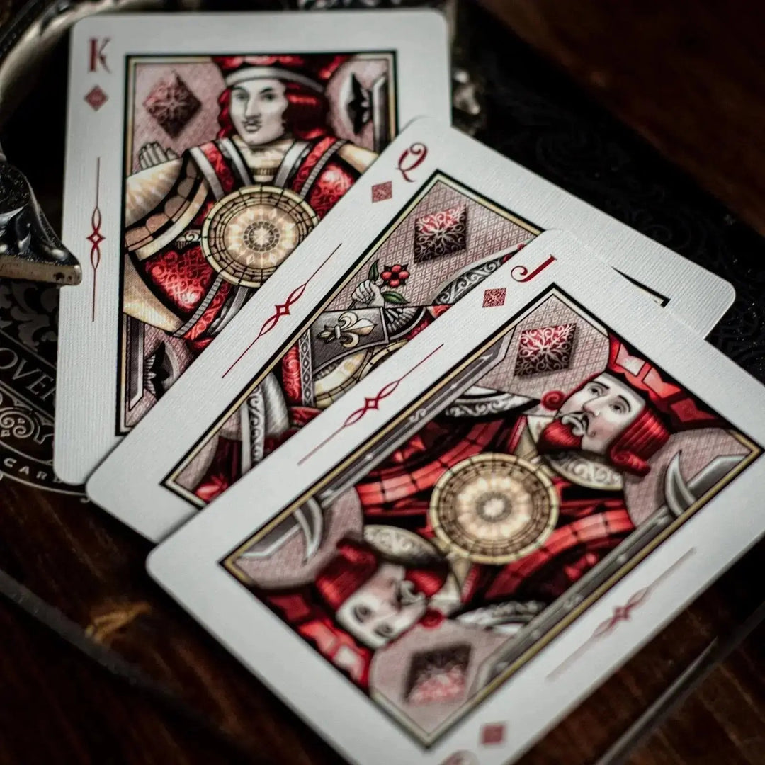 Sovereign luxury playing cards showcasing detailed King and Jack designs in vibrant colors