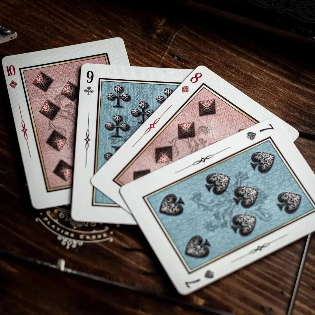 Sovereign luxury playing cards with unique designs and high-quality finish on a wooden surface