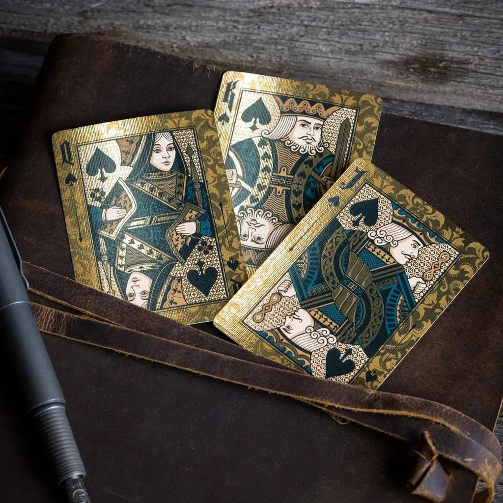 Stone Garden Second Edition playing cards featuring intricate gold and blue designs on premium cardstock
