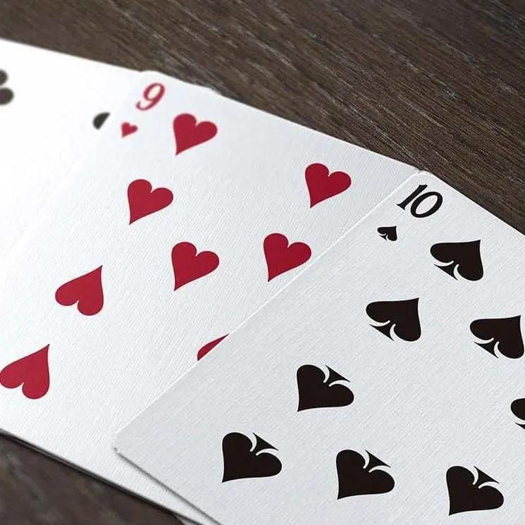 Top Aces WWI playing cards featuring red and black heart designs on high-quality card stock